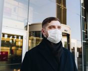 Man in a mask outside building, Platinum Resumes, Kansas City, MO