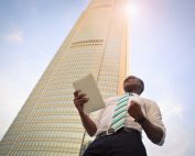 Man at bottom of highrise, Platinum Resumes, Kansas City, MO