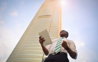 Man at bottom of highrise, Platinum Resumes, Kansas City, MO