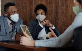 3 people in masks at a laptop, Platinum Resumes, Kansas City, MO