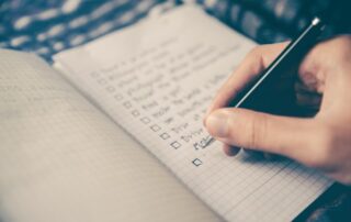 Person making a checklist with boxes, Platinum Resumes, Kansas City, MO